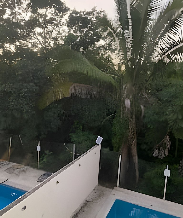 C12 · Casa 2 niveles, alberca y vista al manglar