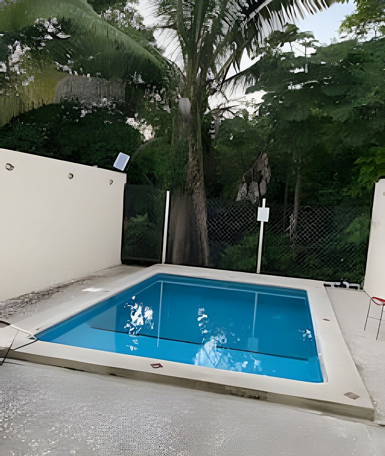 C12 · Casa 2 niveles, alberca y vista al manglar