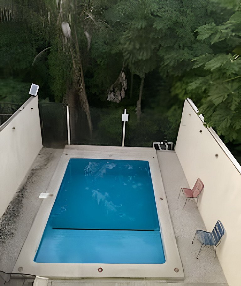 C12 · Casa 2 niveles, alberca y vista al manglar
