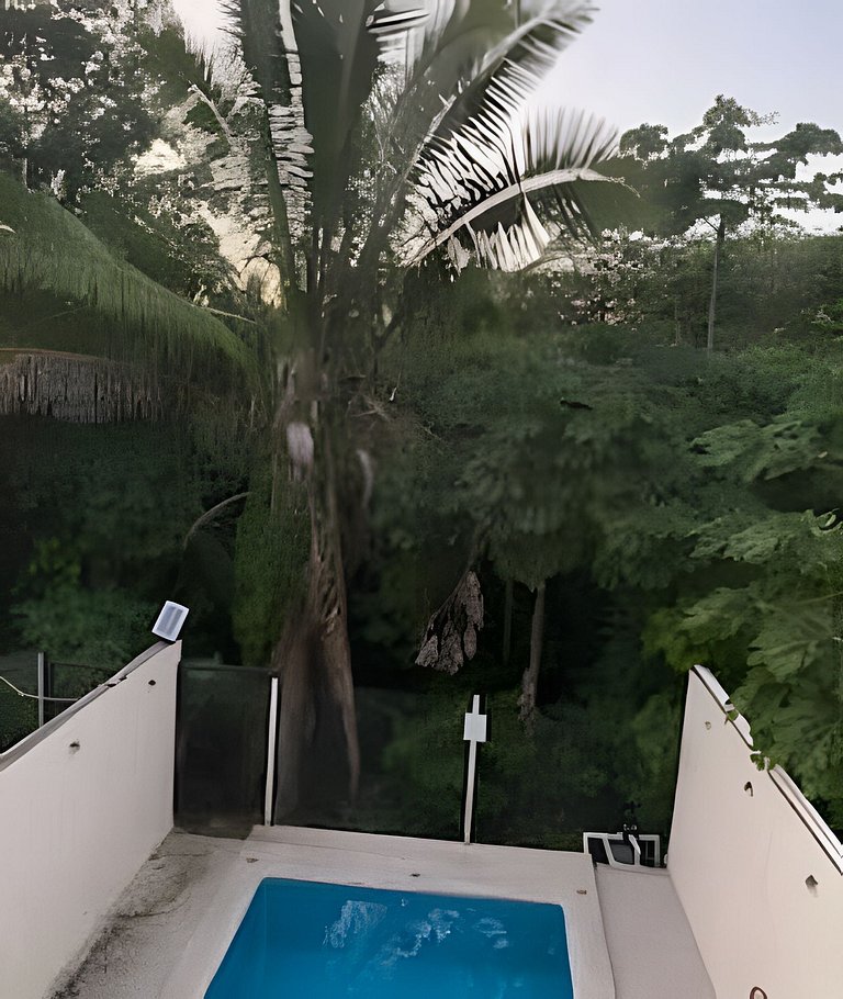 C12 · Casa 2 niveles, alberca y vista al manglar