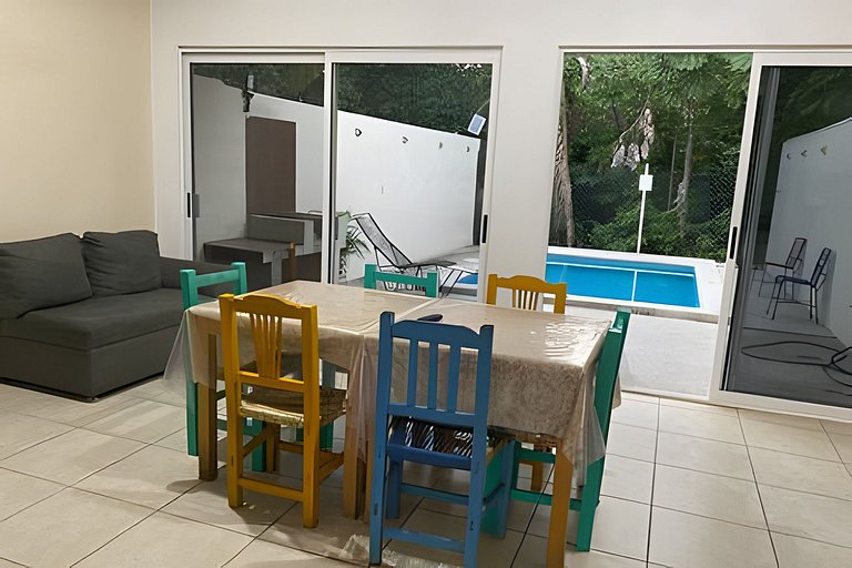 C12 · Casa 2 niveles, alberca y vista al manglar