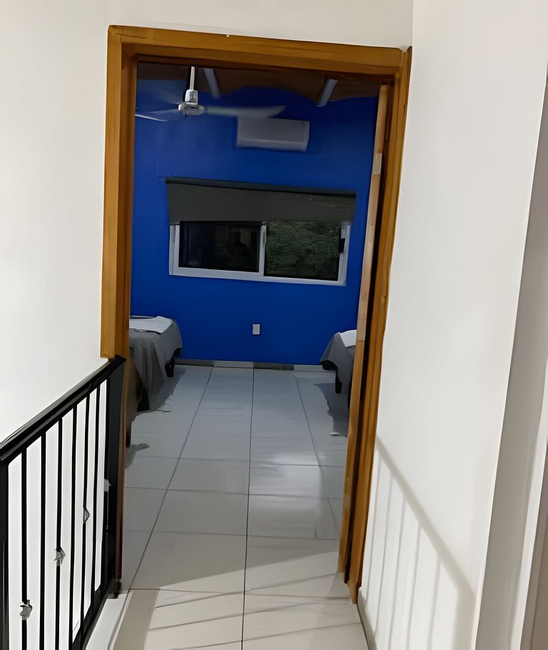 C12 · Casa 2 niveles, alberca y vista al manglar
