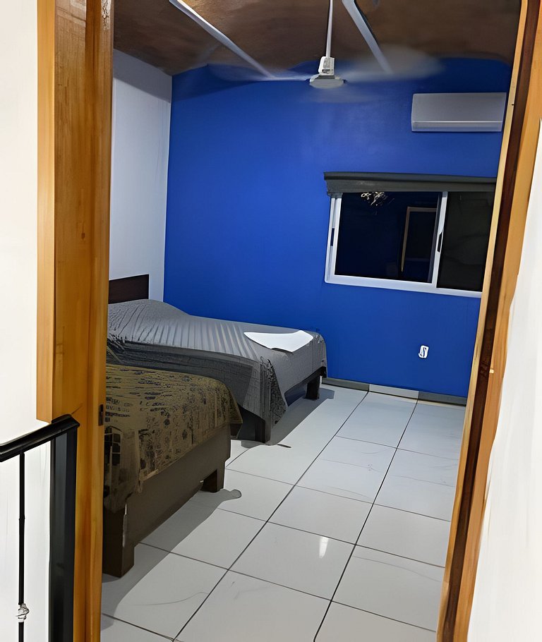 C12 · Casa 2 niveles, alberca y vista al manglar