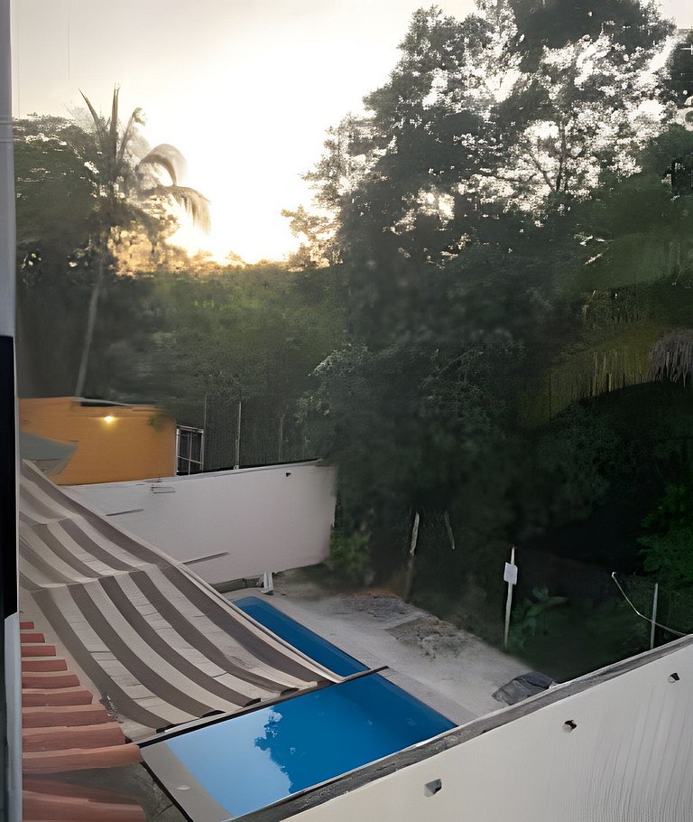 C12 · Casa 2 niveles, alberca y vista al manglar