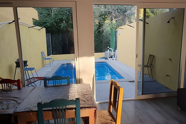C11 · Casa 2 niveles, alberca y vista al manglar
