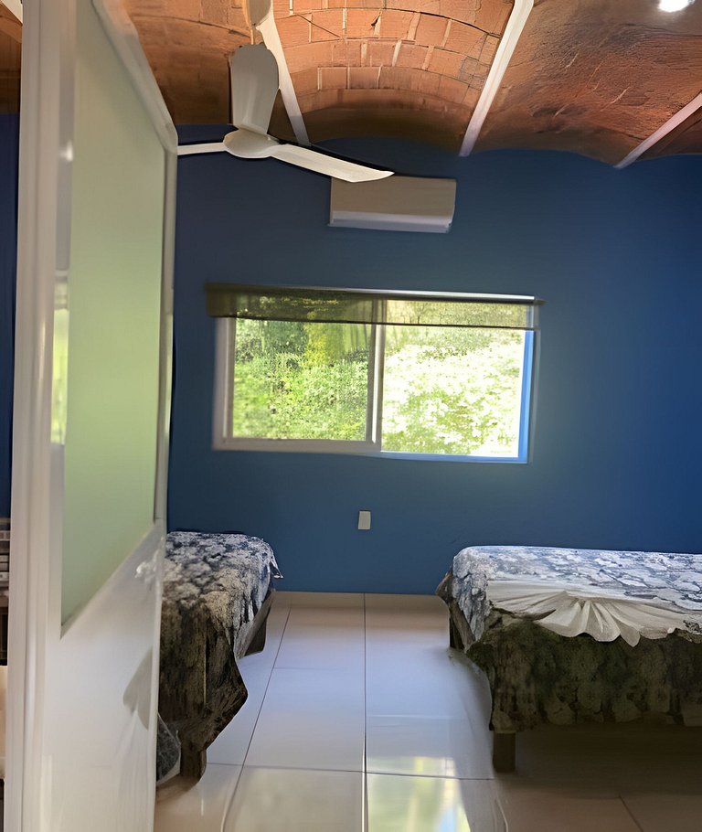 C11 · 2-level house, pool, and mangrove view